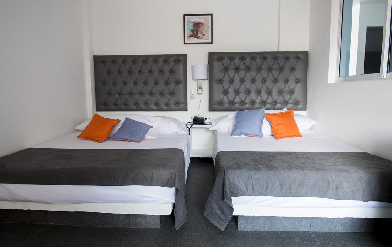 Hotel Grand H&R Villeta Bagian luar foto