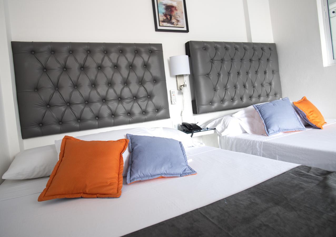 Hotel Grand H&R Villeta Bagian luar foto