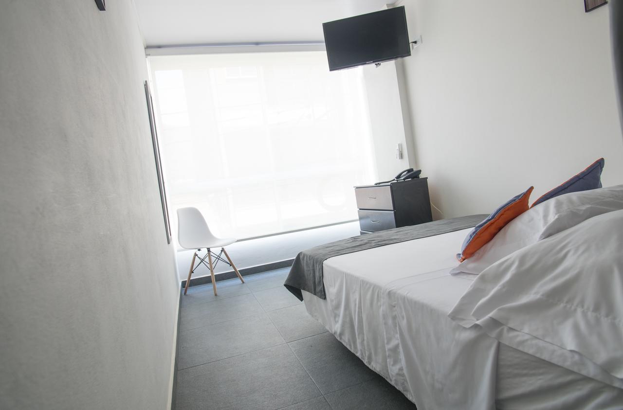 Hotel Grand H&R Villeta Bagian luar foto